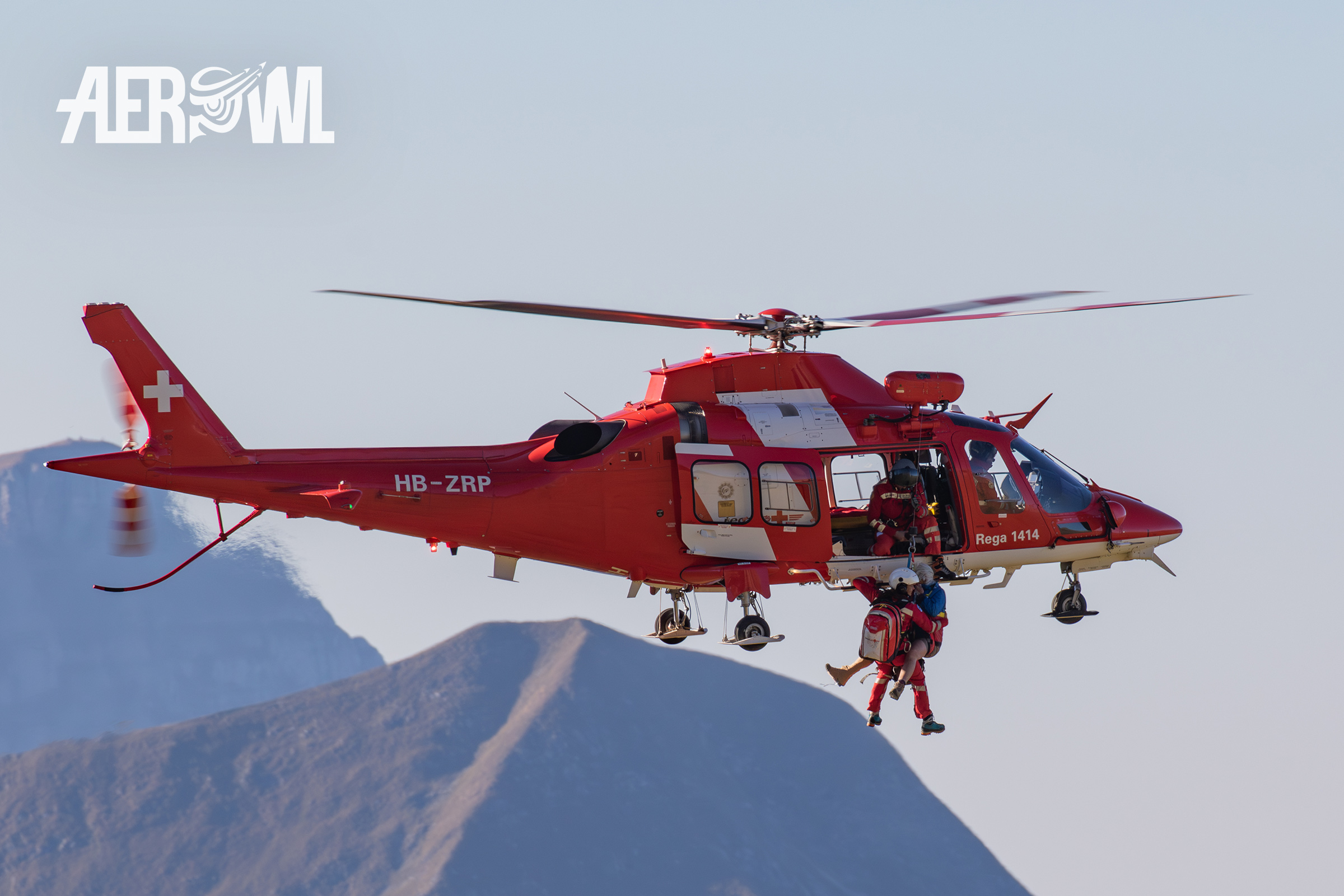 A AgustaWestland Da Vinci - Rega during a rescue mission after the Axalp 2018 in the Swiss mountains.