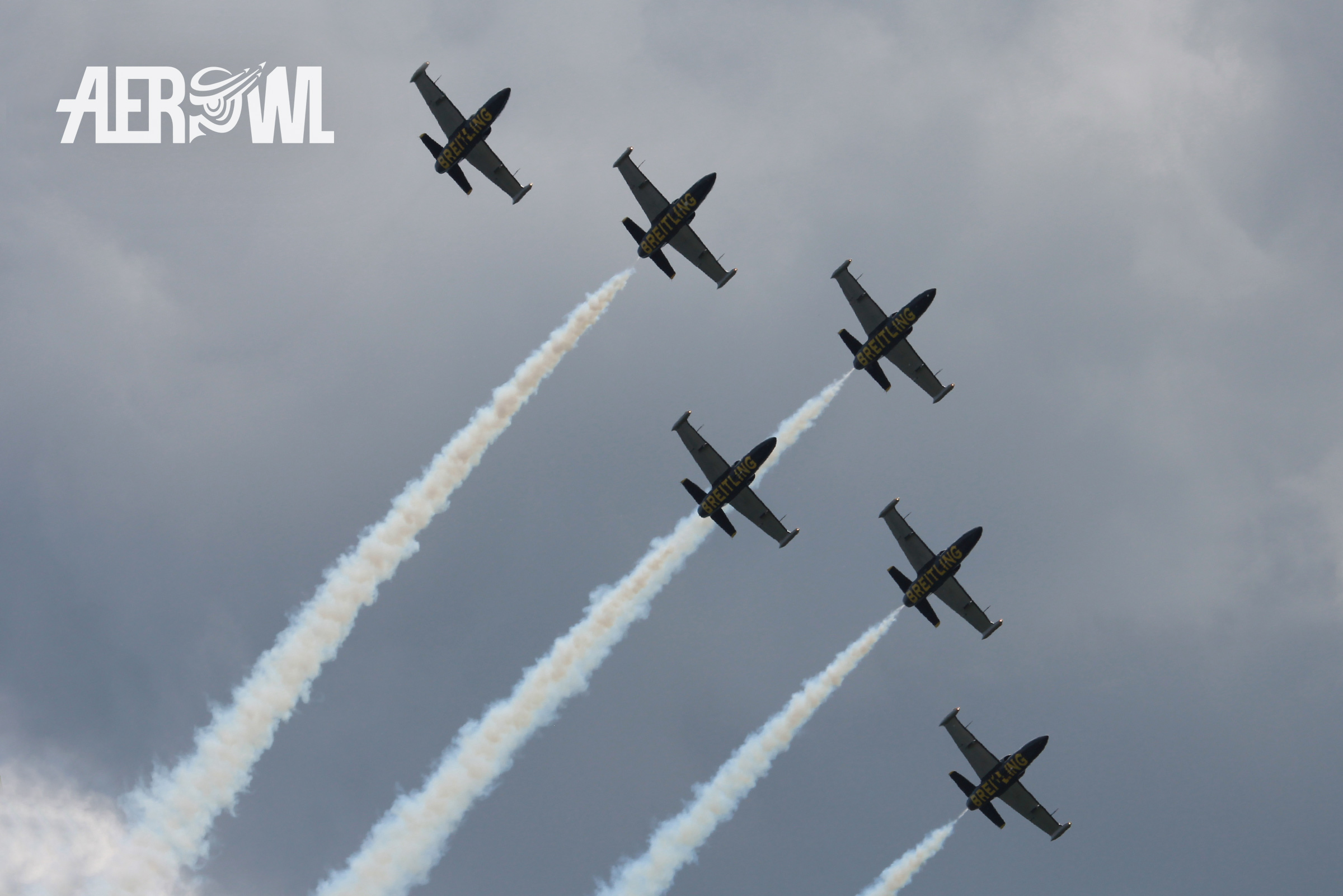 The beautiful yellow and blue Breitling Jet Team in their Aero L-39 Albatros machines during the ILA 2014 over the BER airport in Berlin/Brandenburg, Germany.