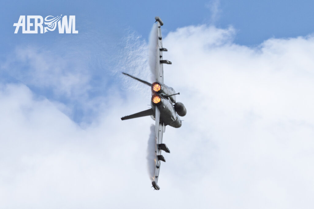 A Boeing EA-18 Growler (F/A-18F Hornet) hard turning with full afterburner at the the Sun´n Fun 2025 in Lakeland, Florida.