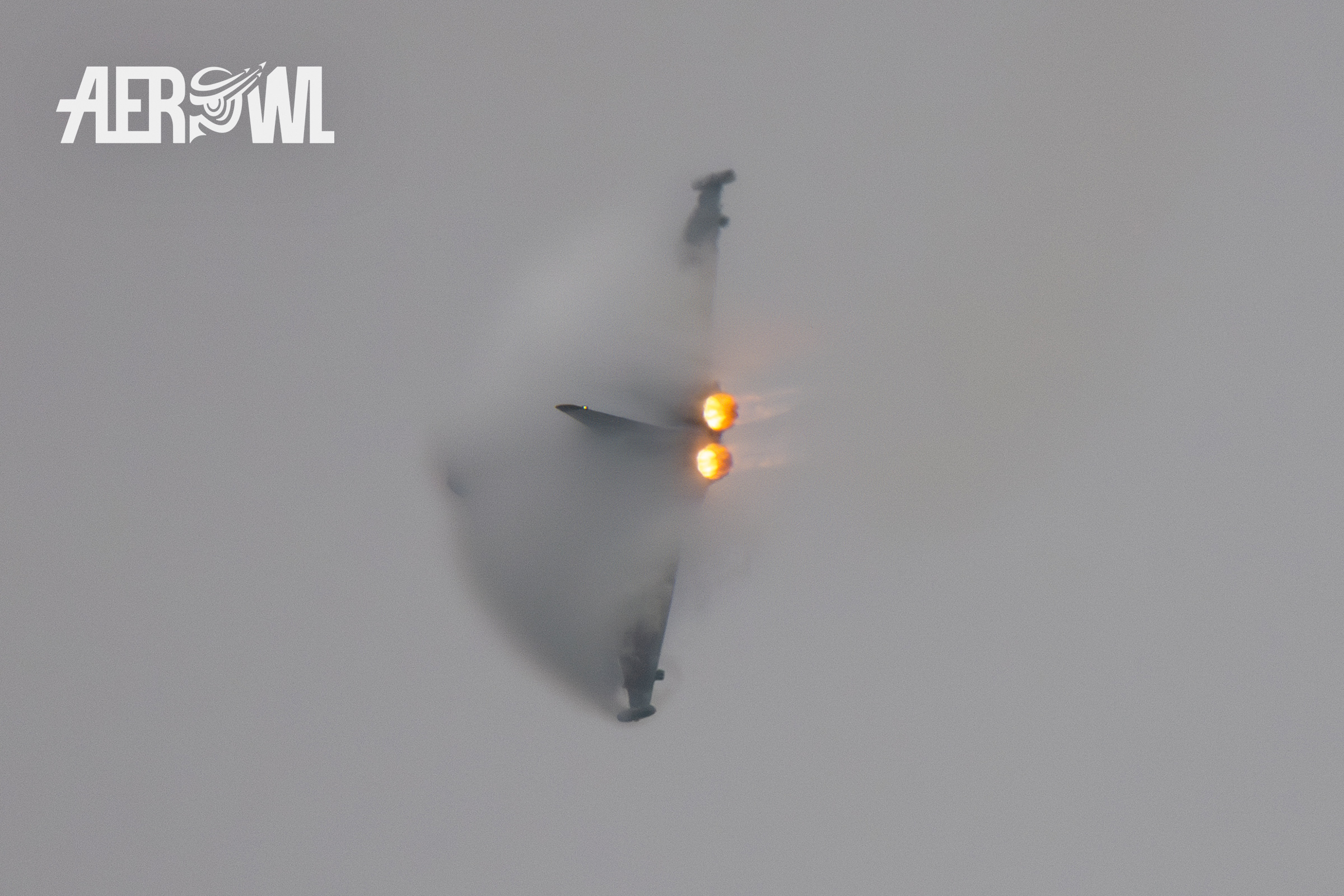 A Bundeswehr Eurofighter Typhoon almost disappears in the fog during his powerfull air display over the Hinterstoisser airbase at the AirPower24 in Zeltweg, Austria.