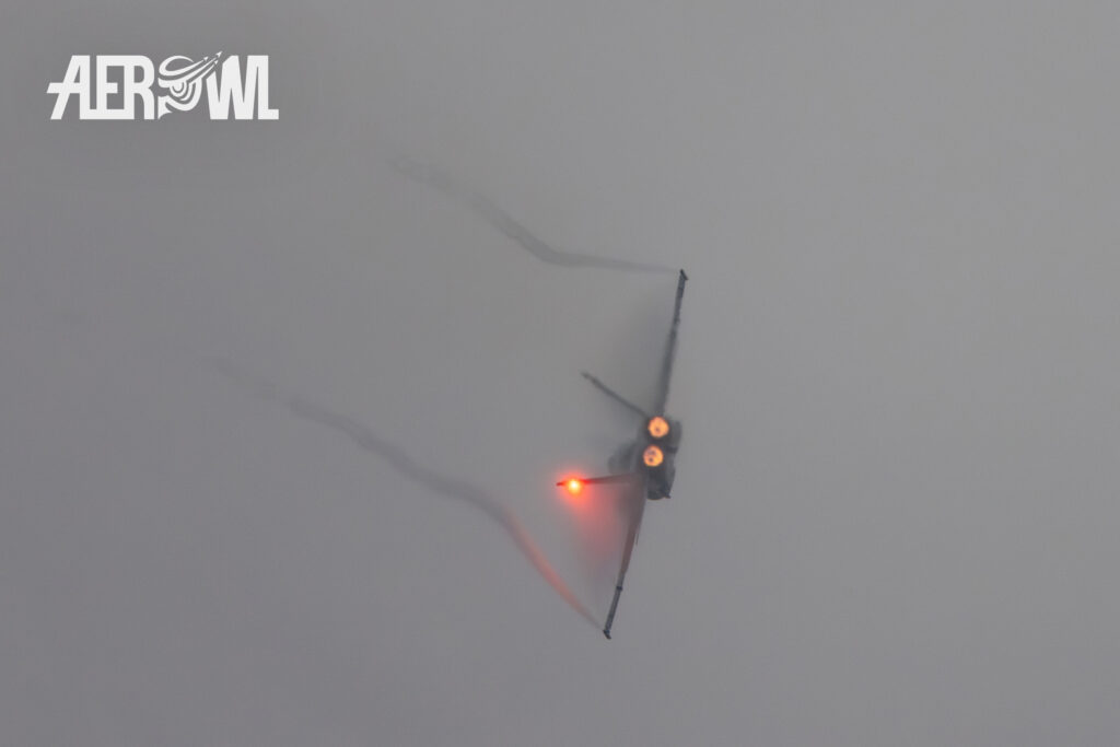 A Boeing F/A-18C Hornet of the Swiss Air Force flies a hard turn with afterburner during its air display at the AirPower24 in Zeltweg, Austria.