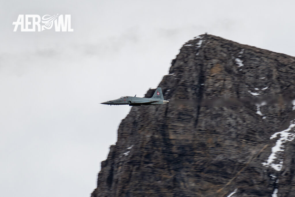 A Swiss Air Force Northrop F-5E-Tiger II fly by during the Axalp Fliegerschiessen 2018 in the Swiss Alps.