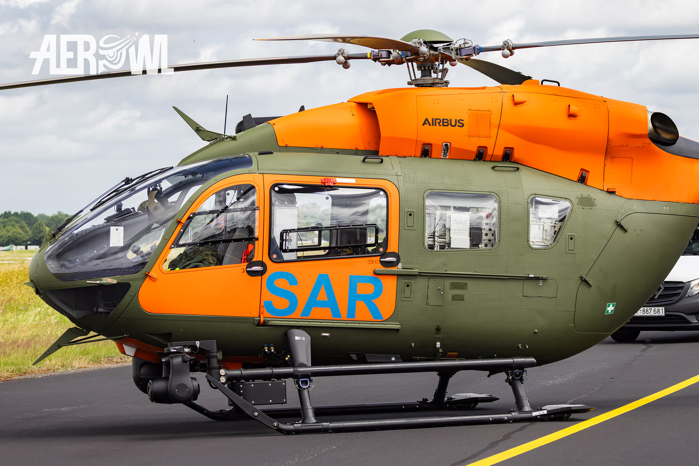 A brand new and cleand parking H145M LUH SAR Airbus helicopter at the end of the taxiway at German Armed Forces Day (Tag der Bundeswehr) 2025 in Jagel, Schleswig-Holstein, Germany.