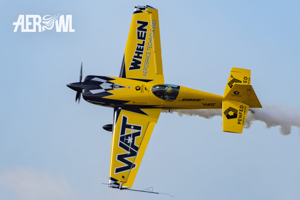 Pilote Michael Goulian turning in his yellow Extra 330SC aerobatics plane at the Sun´n Fun 2025 in Lakeland, Florida.