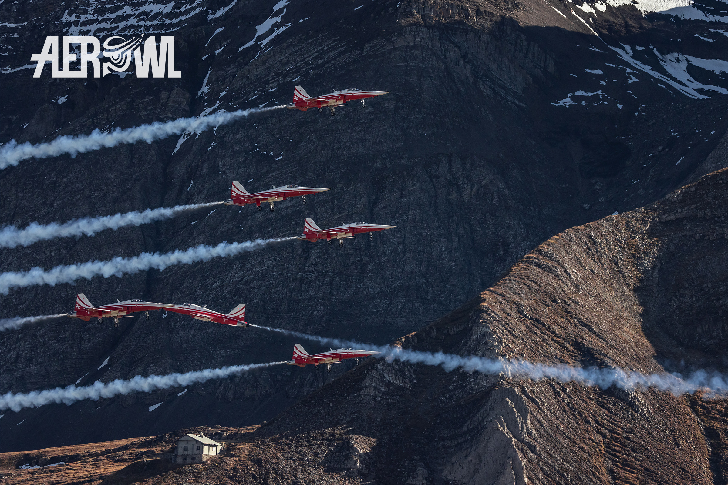 The furious "tunnel" display of the Patrouille Suisse performed in their Northrop F-5E Tiger II during the Axalp 2022 airshow in the Swiss mountains.