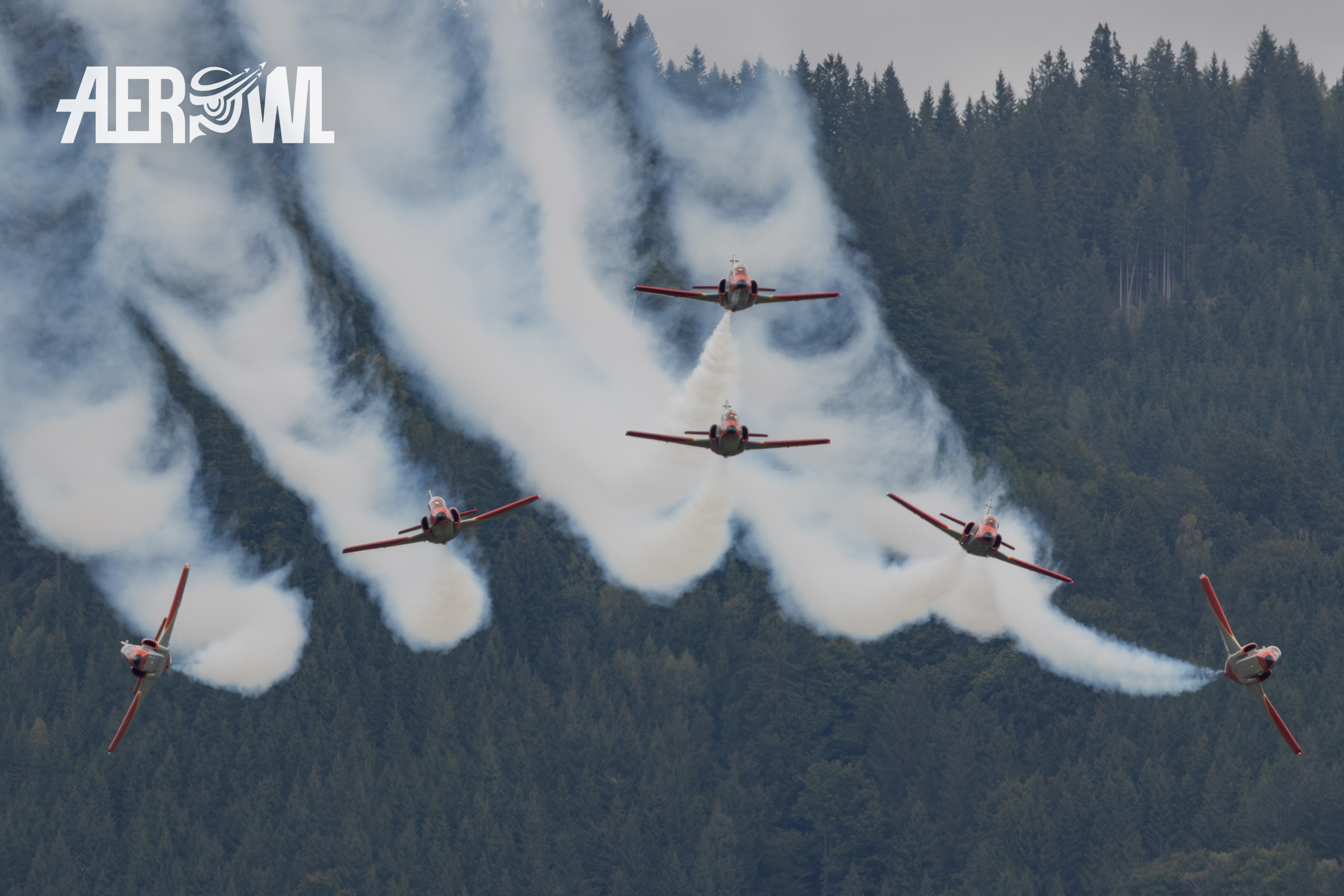 The legendary Spanish Patrulla Águila in their Casa C-101 Aviojets performing the split during the AirPower24 in Zeltweg, Austria.