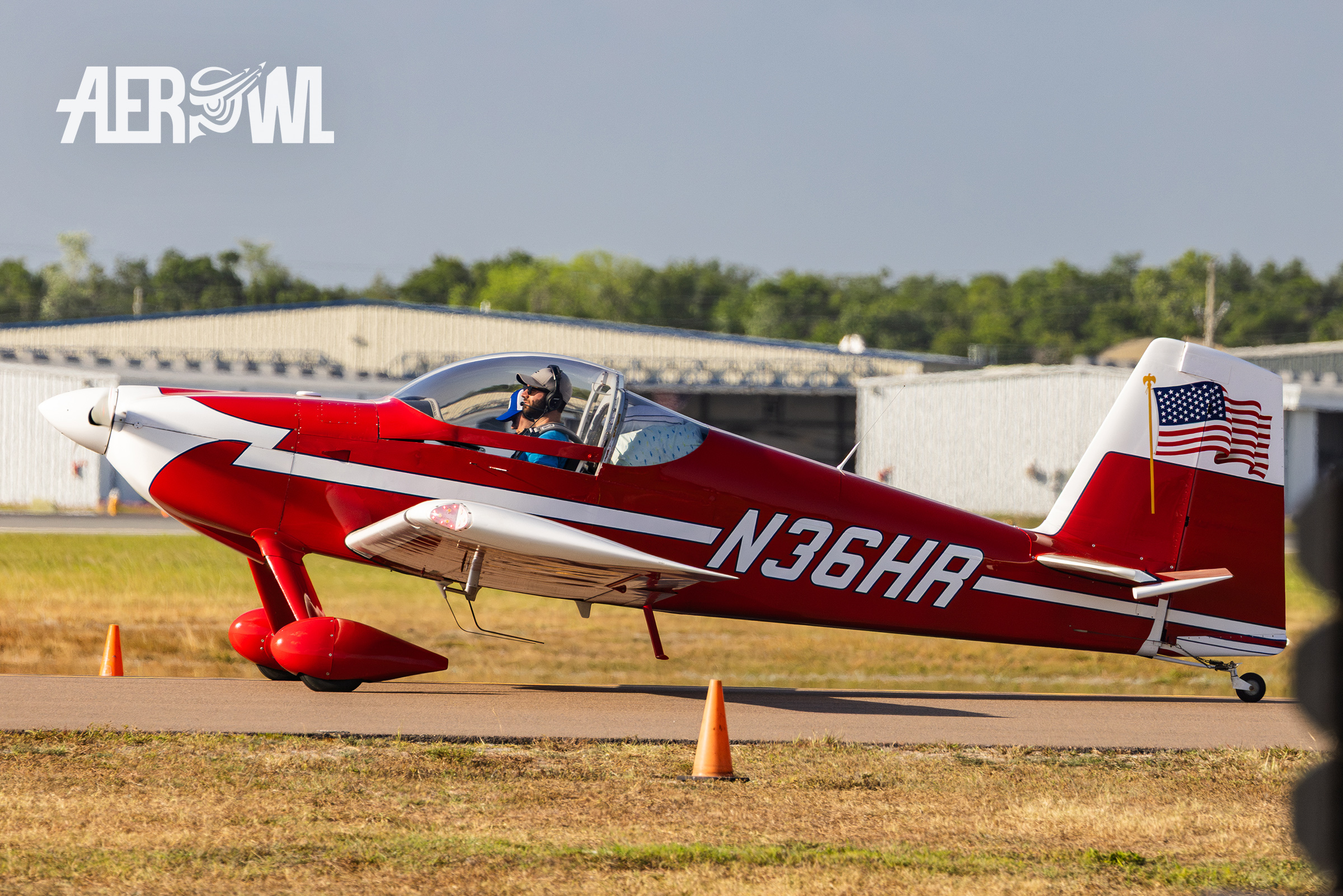 A red sportive looking Van's RV-7 heading towards the runway during Sun'n Fun 2025 in Lakeland, Florida,