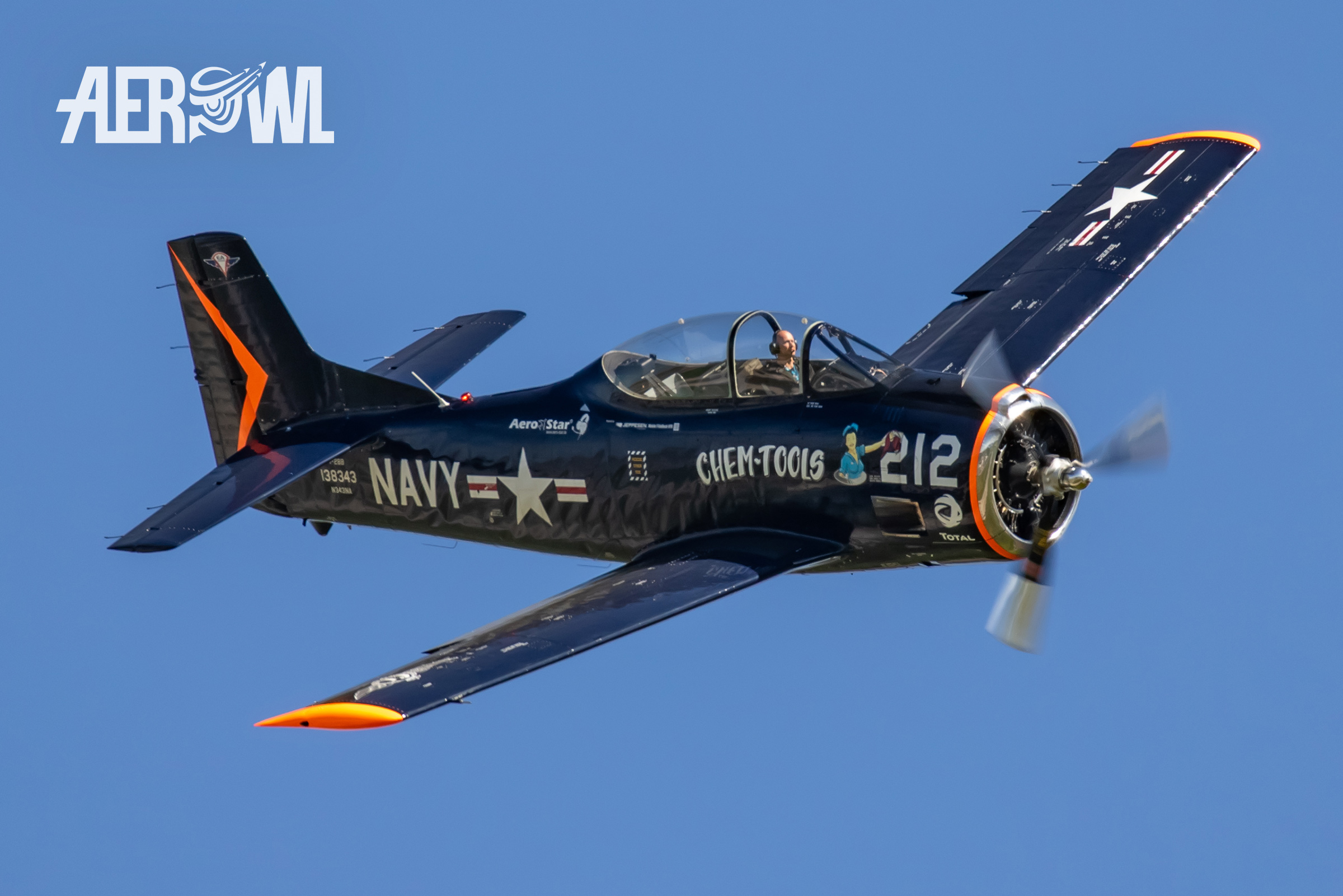 Air display of a North American T-28 Trojan during the ILA 2018 over the runway of the BER airport Berlin-Brandenburg in Germany..