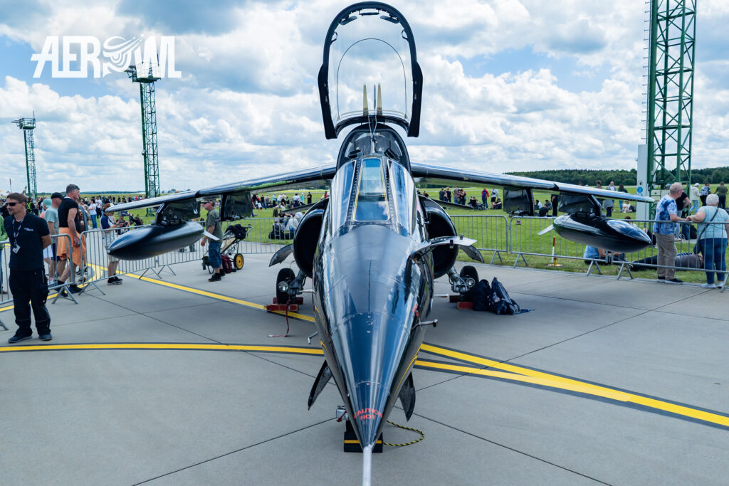 Top Aces' Alpha Jet trainer on static display at the Tag der Bundeswehr 2026 at Fliegerhorst Laage in Germany.