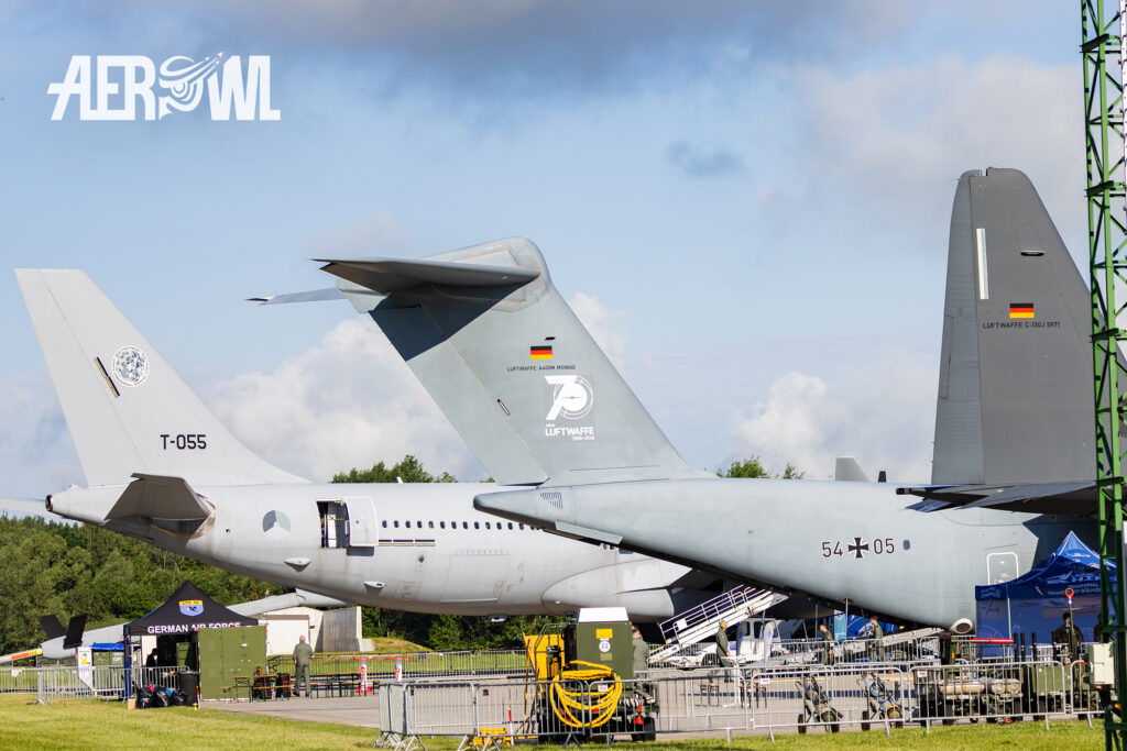 The large tails of the A330, A400M, and a C-130J. The static display of these giants at Fliegerhorst Laage during the Tag der Bundeswehr 2026.