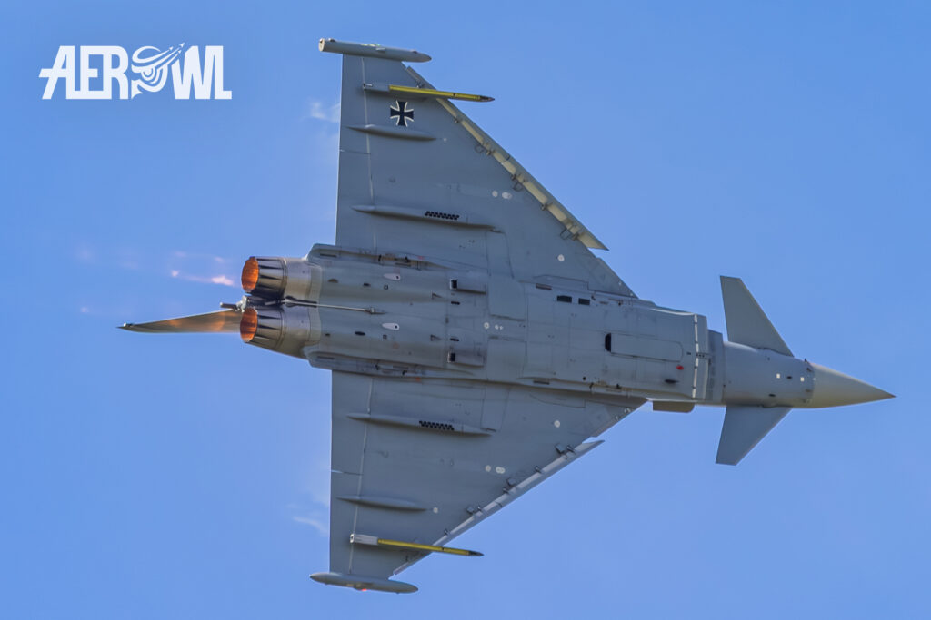A Eurofighter Typhoon performing a tactical pitch turn during the Tag der Bundeswehr 2026 at Fliegerhorst Laage—Tactical Air Force Wing 73 in Germany.