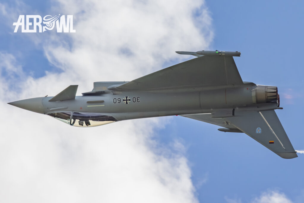Eurofighter Typhoon flying upside down during a flyby at the Tag der Bundeswehr 2026 at Fliegerhorst Laage - Tactical Air Force Wing 73 in Germany.