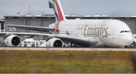 A giant Emirate Airbus A380-800 waiting for the first guests at the ILA Berlin 2026 at the BER Airport Berlin Brandenburg.