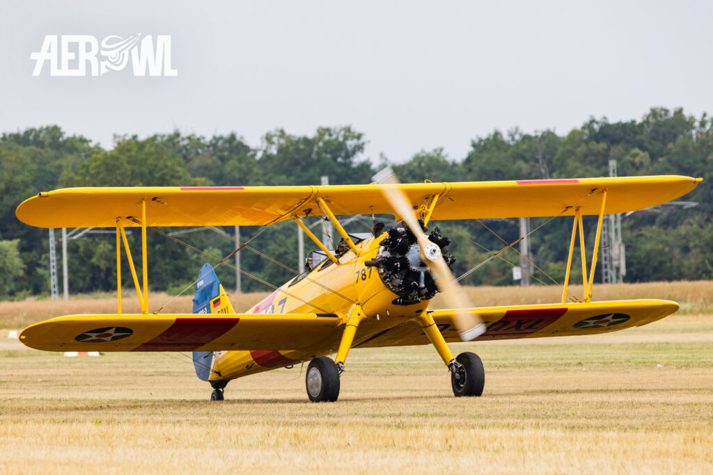 The Boeing Stearman N2S-3 “N3972U” taxis off the runway after landing at the Bienenfarm in Brandenburg as part of the “Stearman & Friends 2026” event.