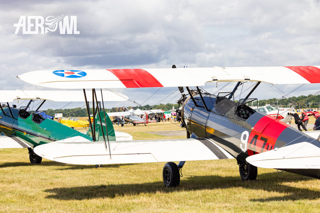 A Boeing B75N1 Stearman “N9478H,” painted in black and white, at the Bienenfarm in Brandenburg as part of the “Stearman & Friends 2026” event.