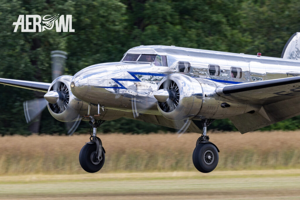 The gleaming Lockheed 12 Electra Junior “N18130” just before touching down at the Stearman & Friends 2026 event at the bee farm in Brandenburg.