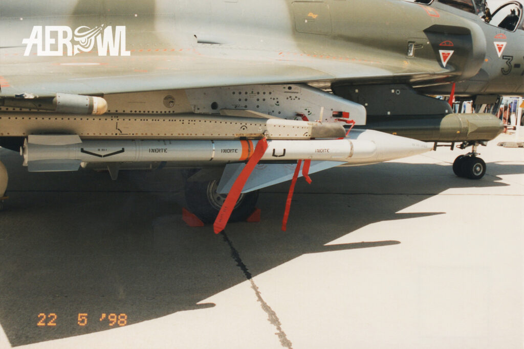 An inert Matra MICA (Missile d’Interception et de Combat Aérien) mounted under a French Air Force Mirage 2000N during the static display at ILA 1998 in Berlin-Schönefeld.